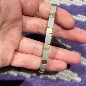 Tan and gold bracelet